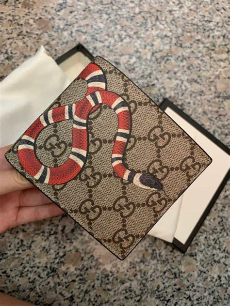 fake gucci mens wallets|authentic Gucci snake wallet.